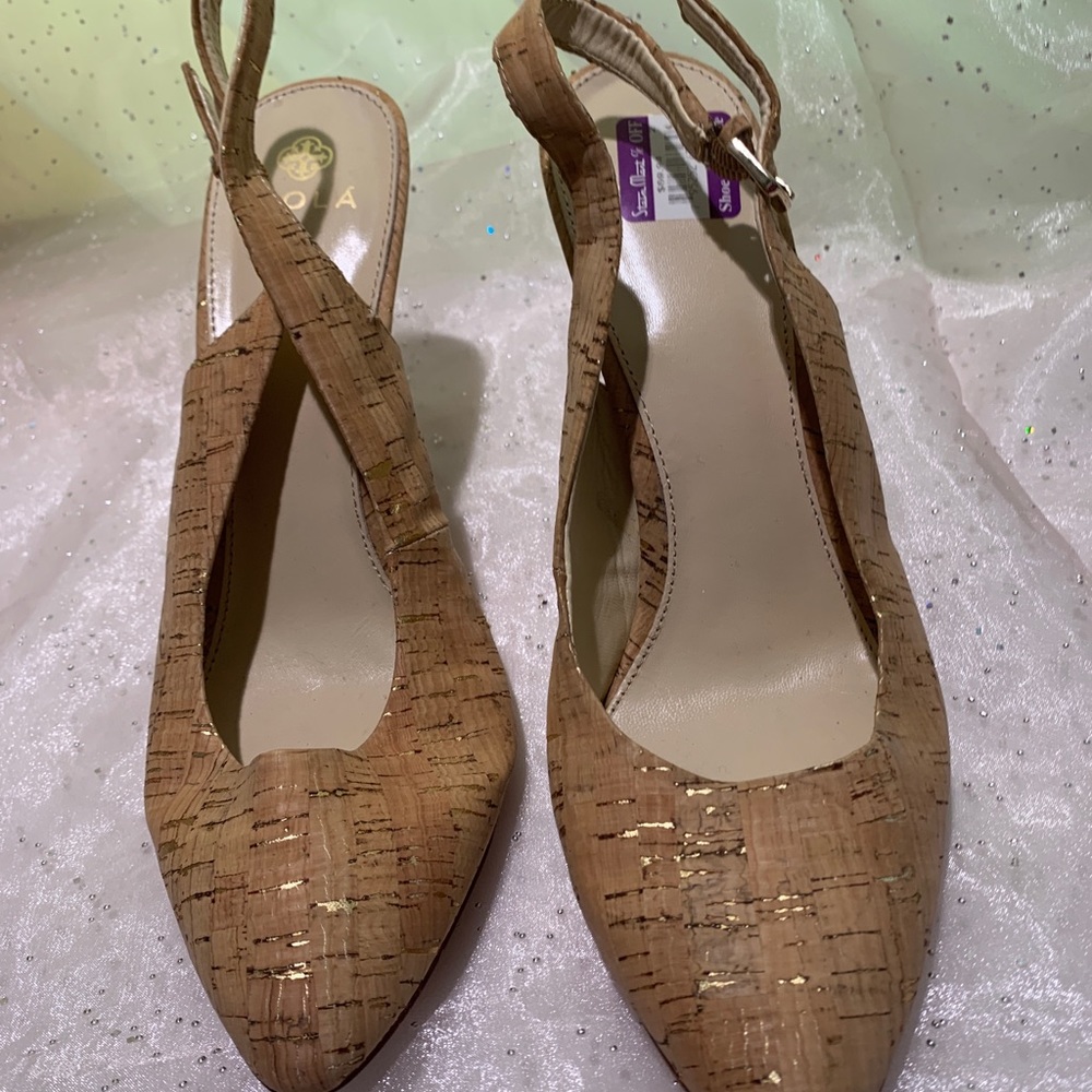 Tan with god detail sling backs by Isola